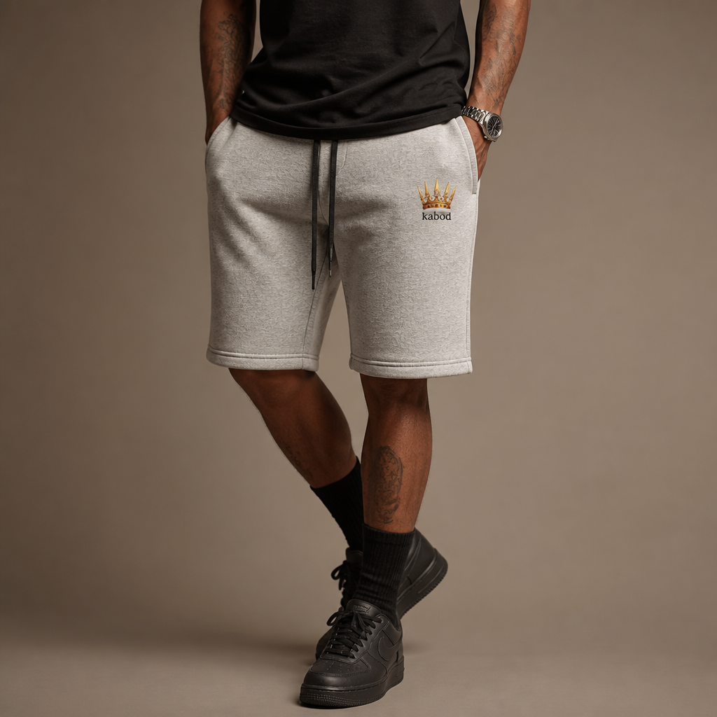 Model in Kabod fleece shorts with crown emblem